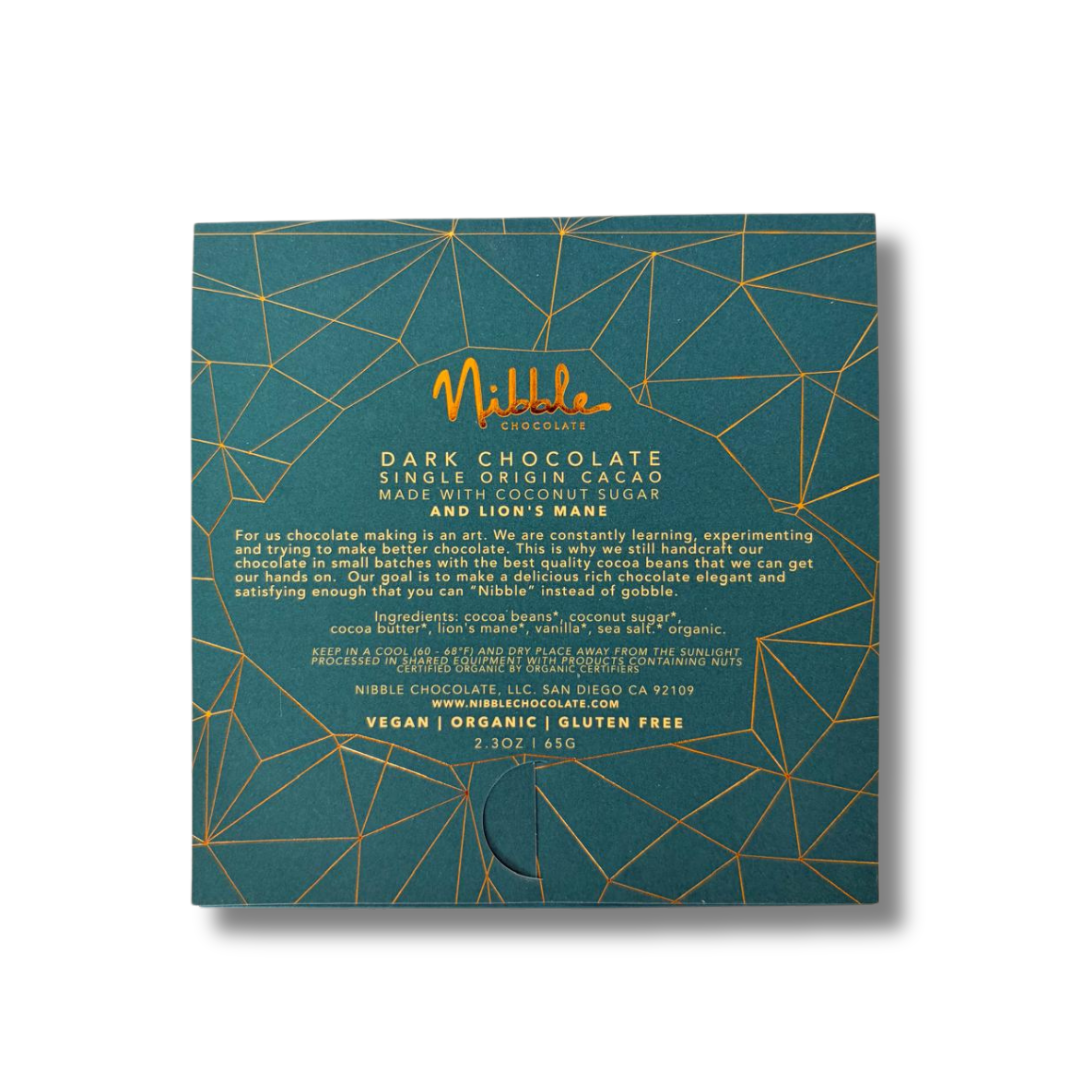 Back of Nibble Lion’s Mane dark chocolate bar with single origin cacao, coconut sugar, vegan, organic and gluten free details.