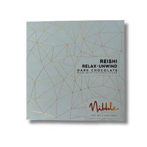 Nibble Reishi Relax Unwind dark chocolate bar made with coconut sugar, front packaging.